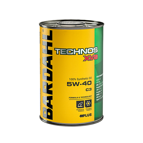 Cylindrical metal oil can with a yellow front label reading 'Technos XVS 5W-40' and '100% Synthetic Oil' in bold, set against a green side panel.